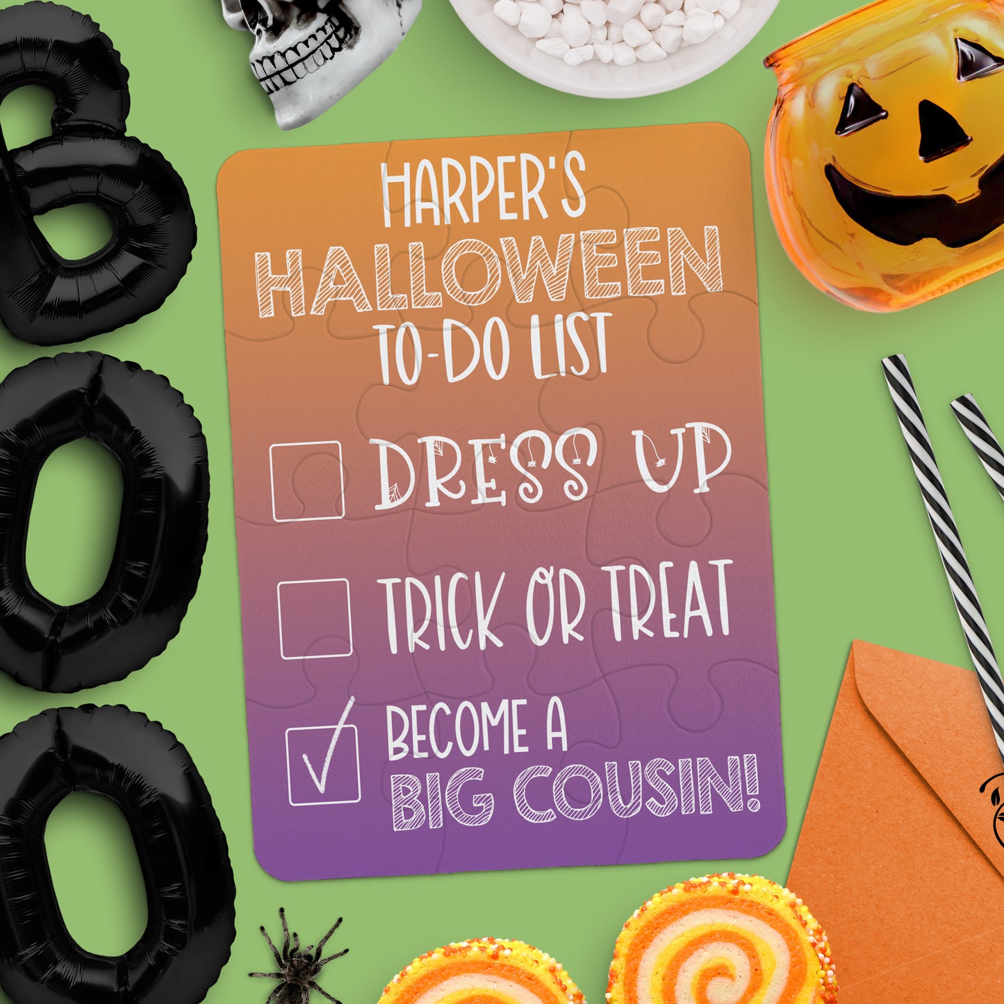 A Halloween-themed flat lay with a checklist reading: "Harperās Halloween To-Do List: Dress Up, Trick or Treat, Become a Big Cousin!" with the last item checked.