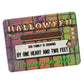 Colorful sign-style announcement card reads: "This Halloween Can't Be Beat. Our Family Is Growing By One Heart And Two Feet. Arriving June 2024.