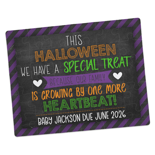 A Halloween-themed puzzle with the text: "This Halloween we have a special treat because our family is growing by one more heartbeat! Baby Jackson due June 2026.