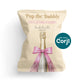 A party favor bag with a champagne bottle illustration, pink bow, and text: “Pop the Bubbly, She’s Getting a Hubby! Bachelorette Party Kit. Edit with Corjl.”.
